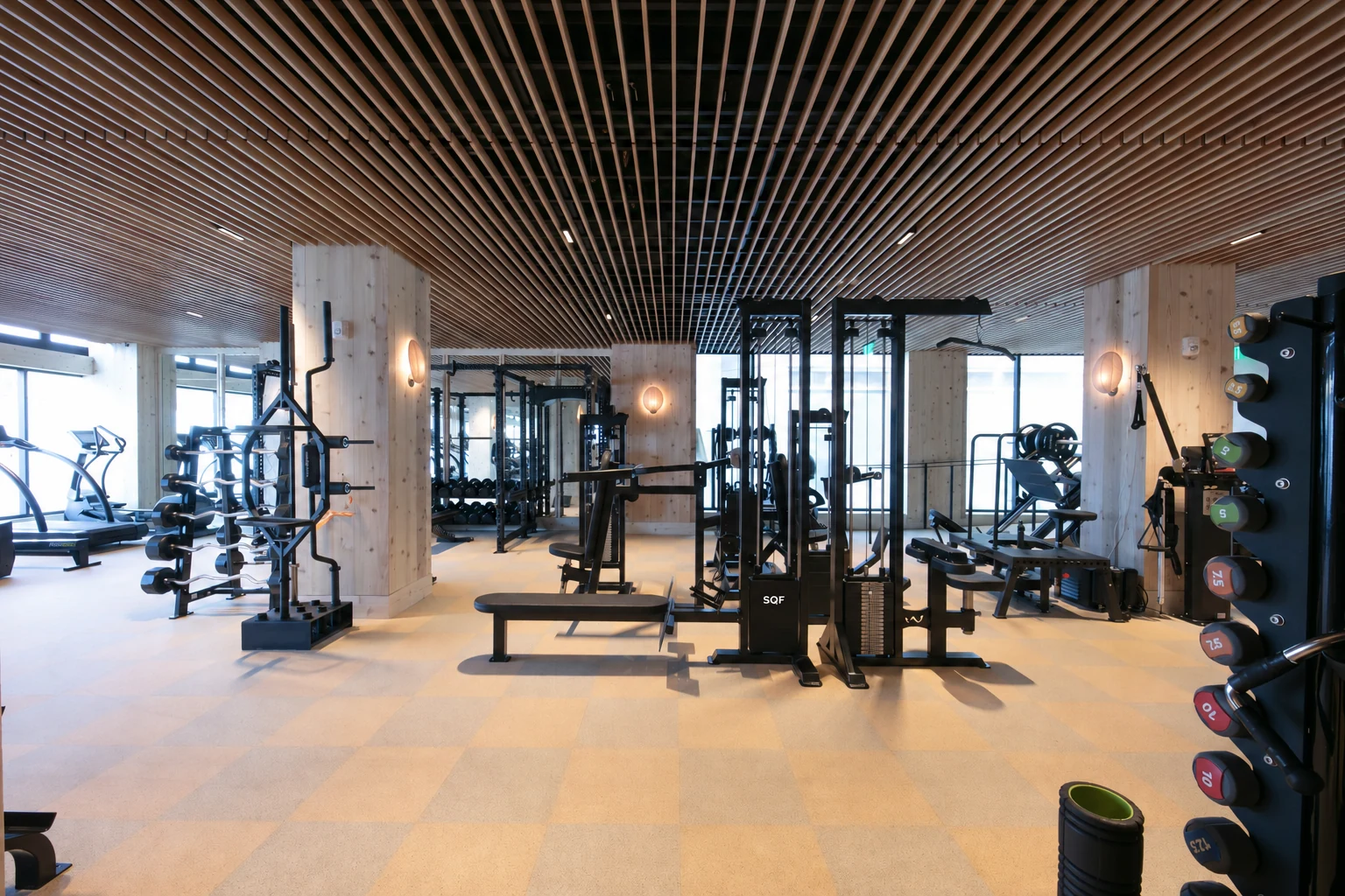 Warm timber detailing in the hotel gym